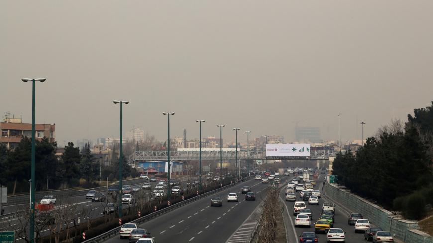 A picture shows a heavily polluted skyline as seen from west of the Iranian capital Tehran on January 12, 2016.  / AFP / ATTA KENARE        (Photo credit should read ATTA KENARE/AFP via Getty Images)